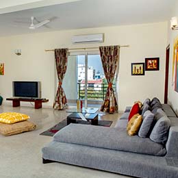 Common Room: Spacious common room with a soothing decor at Concord Casablanca Serviced Apartment