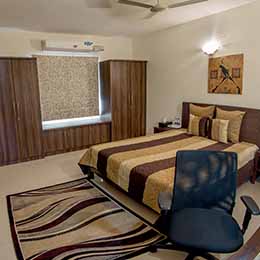 Bed Room: Bedroom with a large and comfortable bed covered in exquisite linen at Concord Casablanca Serviced Apartment