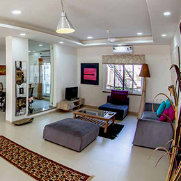 Living Room: Open plan living room provides full access across the apartment at Concord Valley View Serviced Apartment